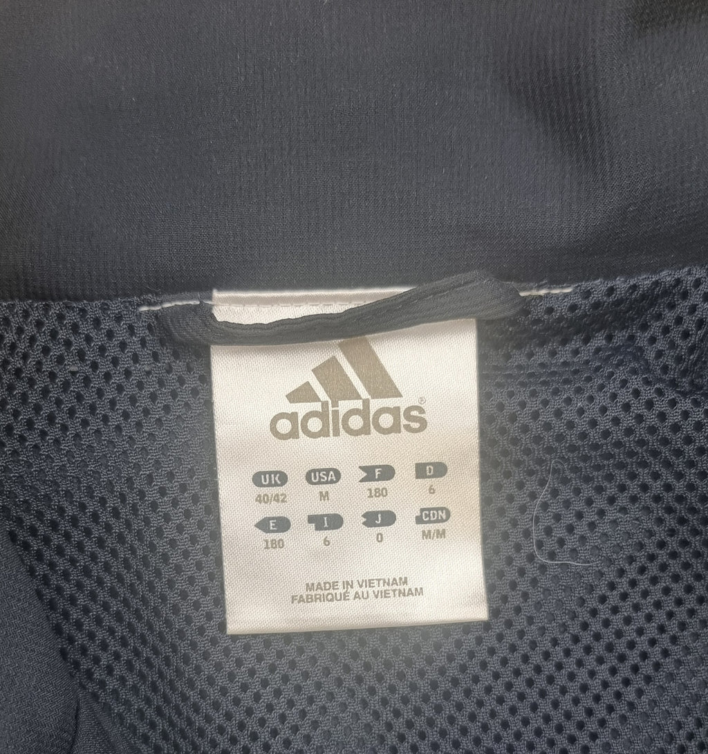 Chaqueta Adidas Track Jacket azul marino y amarilla – Talla M