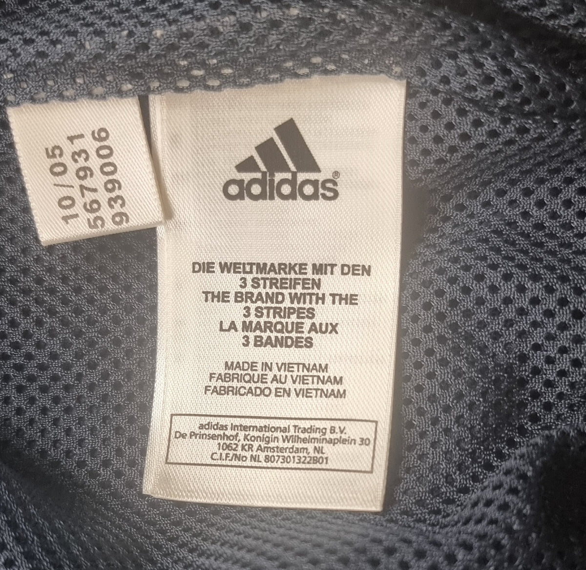 Chaqueta Adidas Track Jacket azul marino y amarilla – Talla M