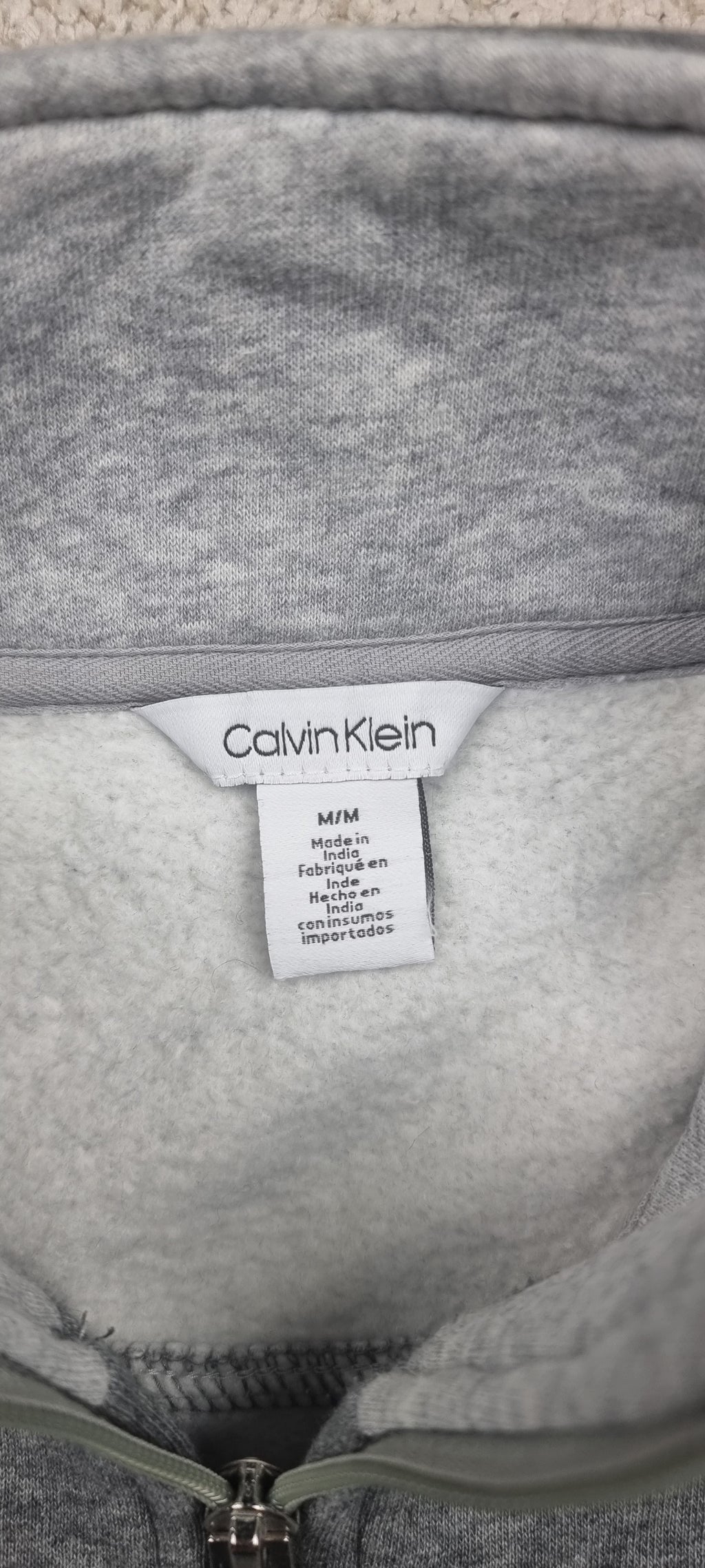 Sudadera Calvin Klein gris con media cremallera talla M