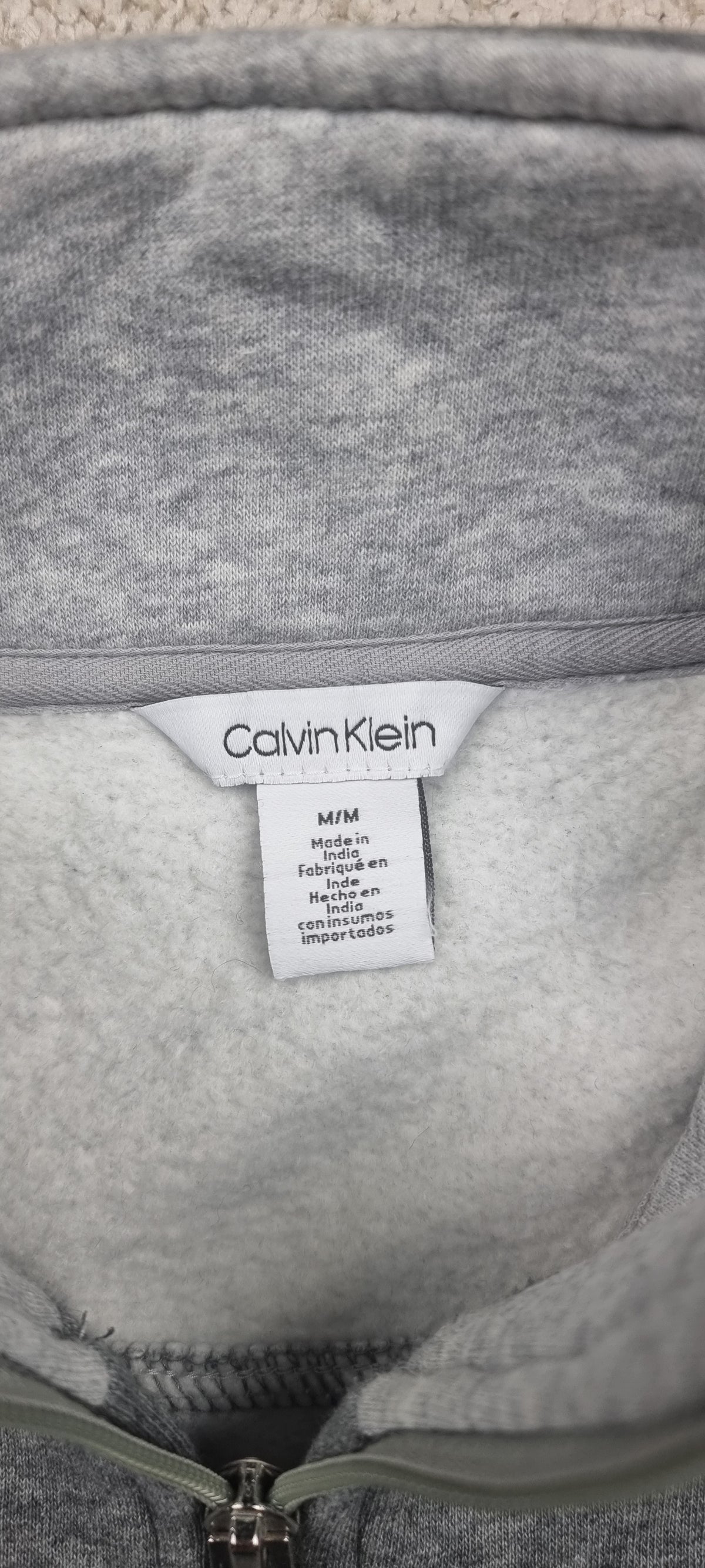 Sudadera Calvin Klein gris con media cremallera talla M