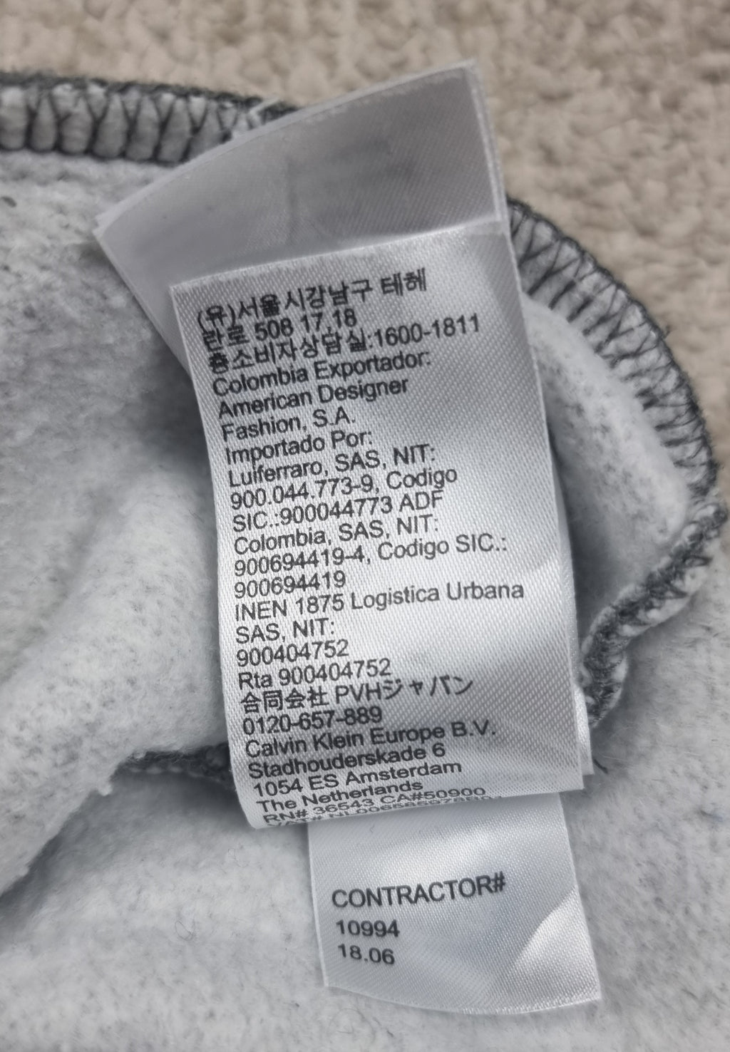 Sudadera Calvin Klein gris con media cremallera talla M