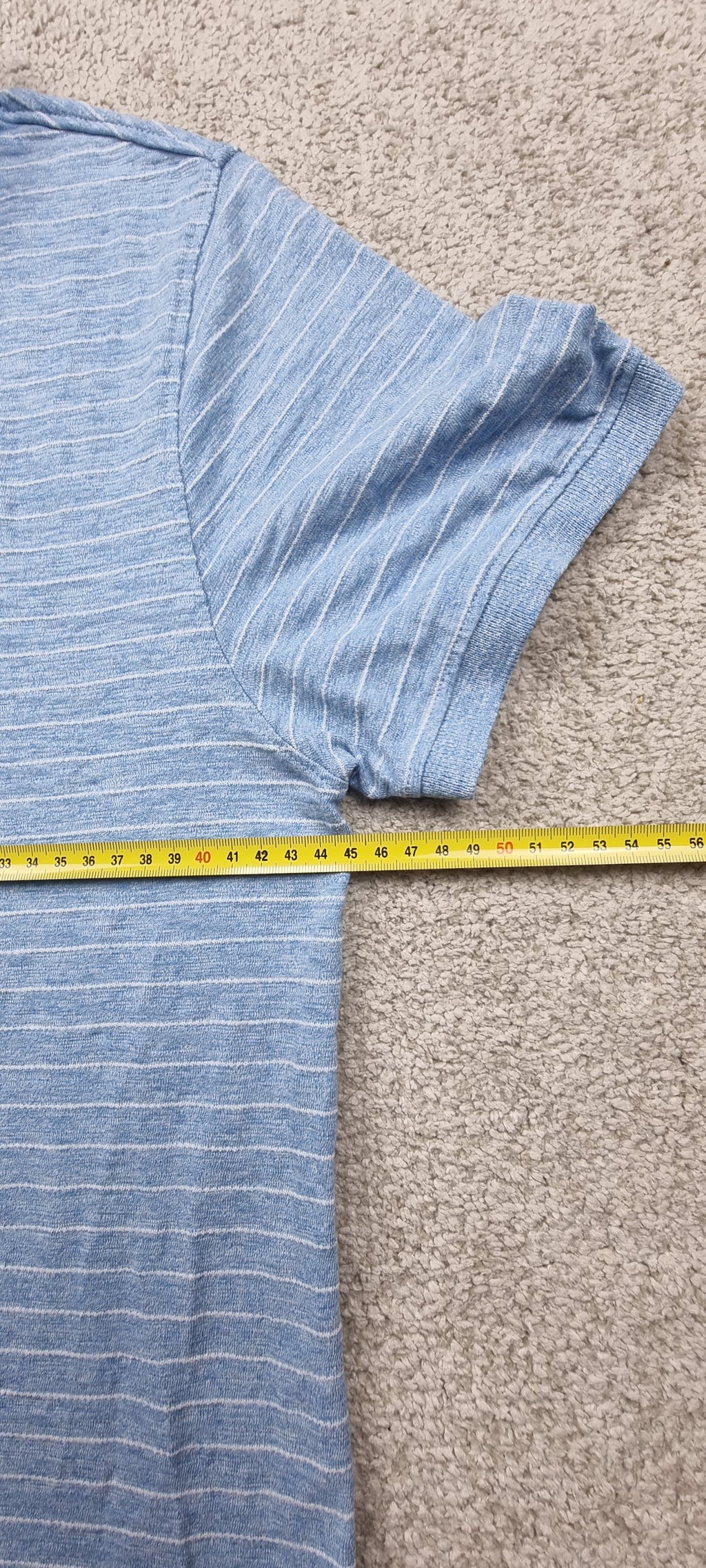 Polo Tommy Jeans azul jaspeado de rayas – Talla L