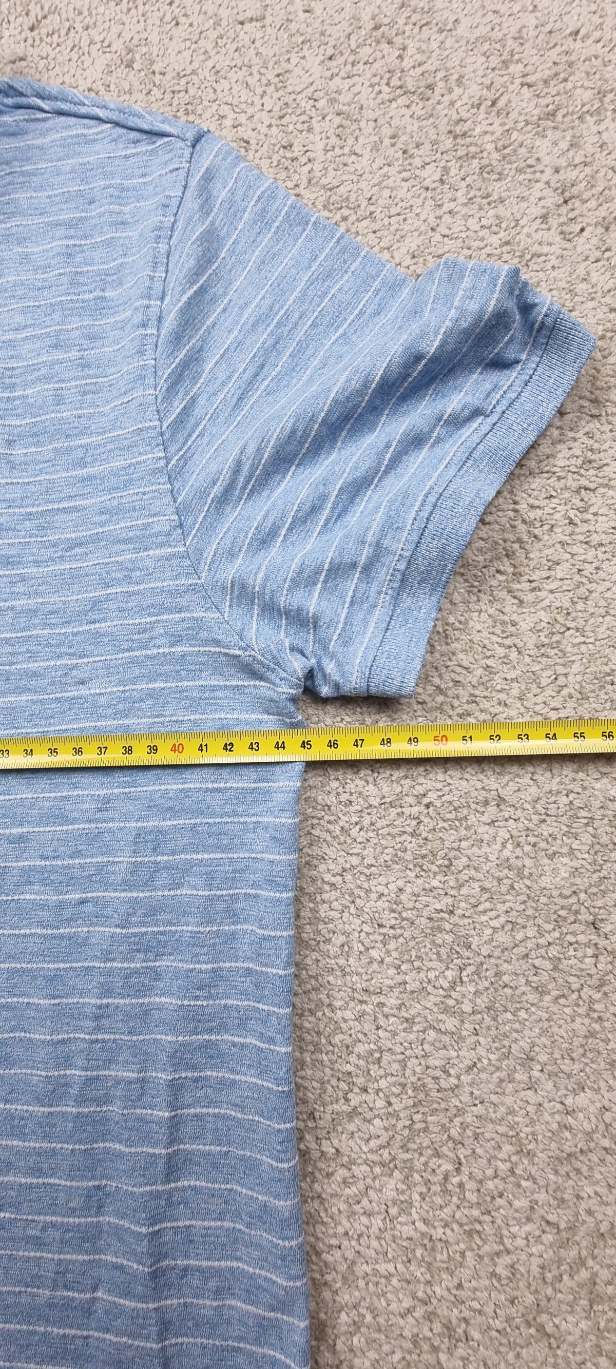 Polo Tommy Jeans azul jaspeado de rayas – Talla L
