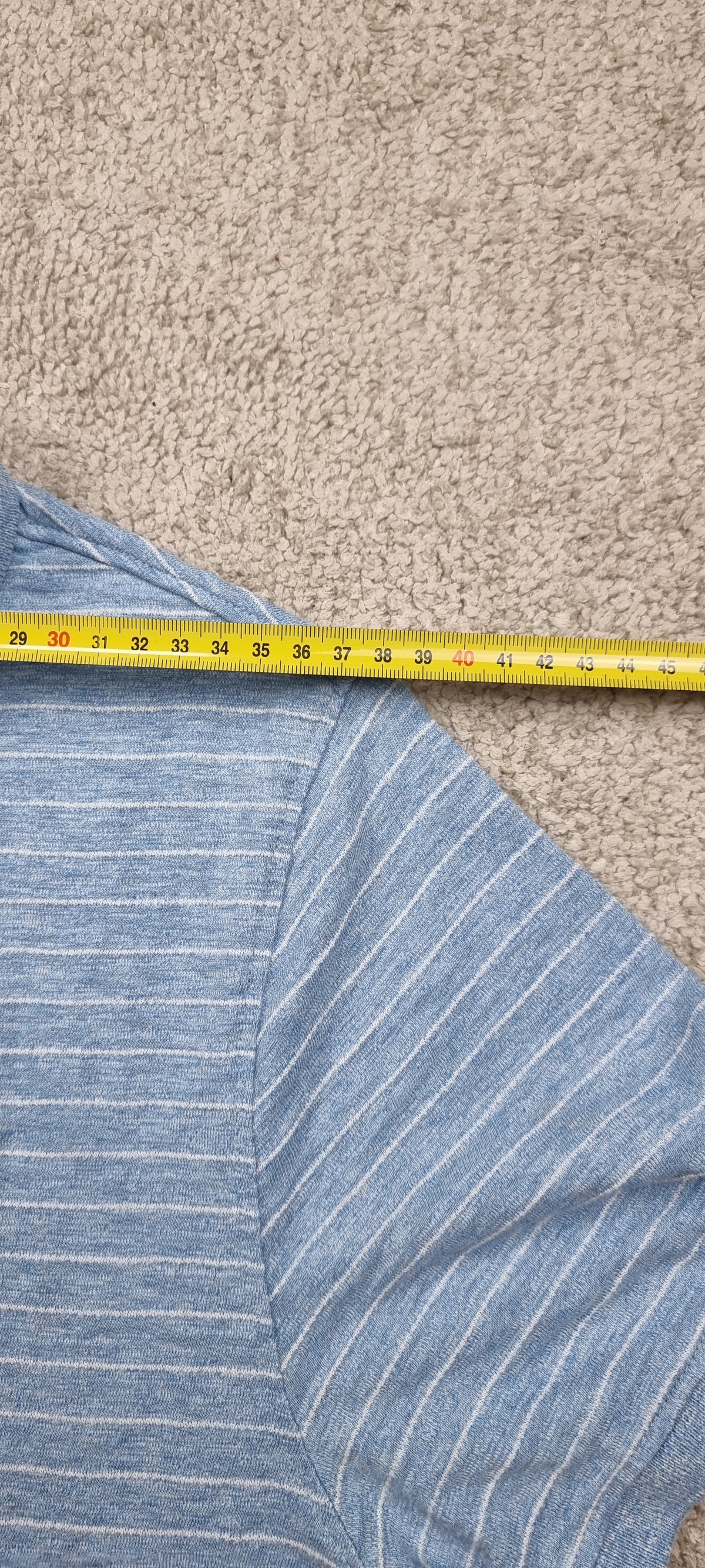 Polo Tommy Jeans azul jaspeado de rayas – Talla L