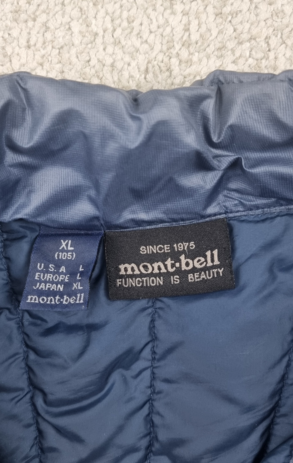 Chaqueta de plumas Mont-bell EX 800 azul marino – Talla L